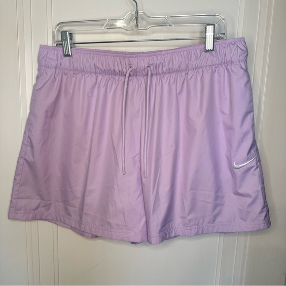 NWT WOMENS NIKE SPORTSWEAR ESSENTIALS REPEL MID-RISE SHORTS large purple 4.5” - Picture 1 of 14